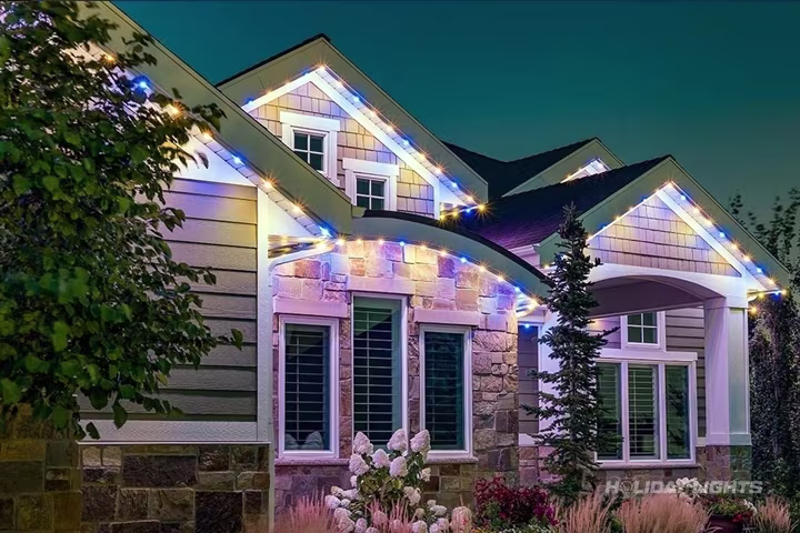 App-controlled permanent LED lighting on a New York home facade