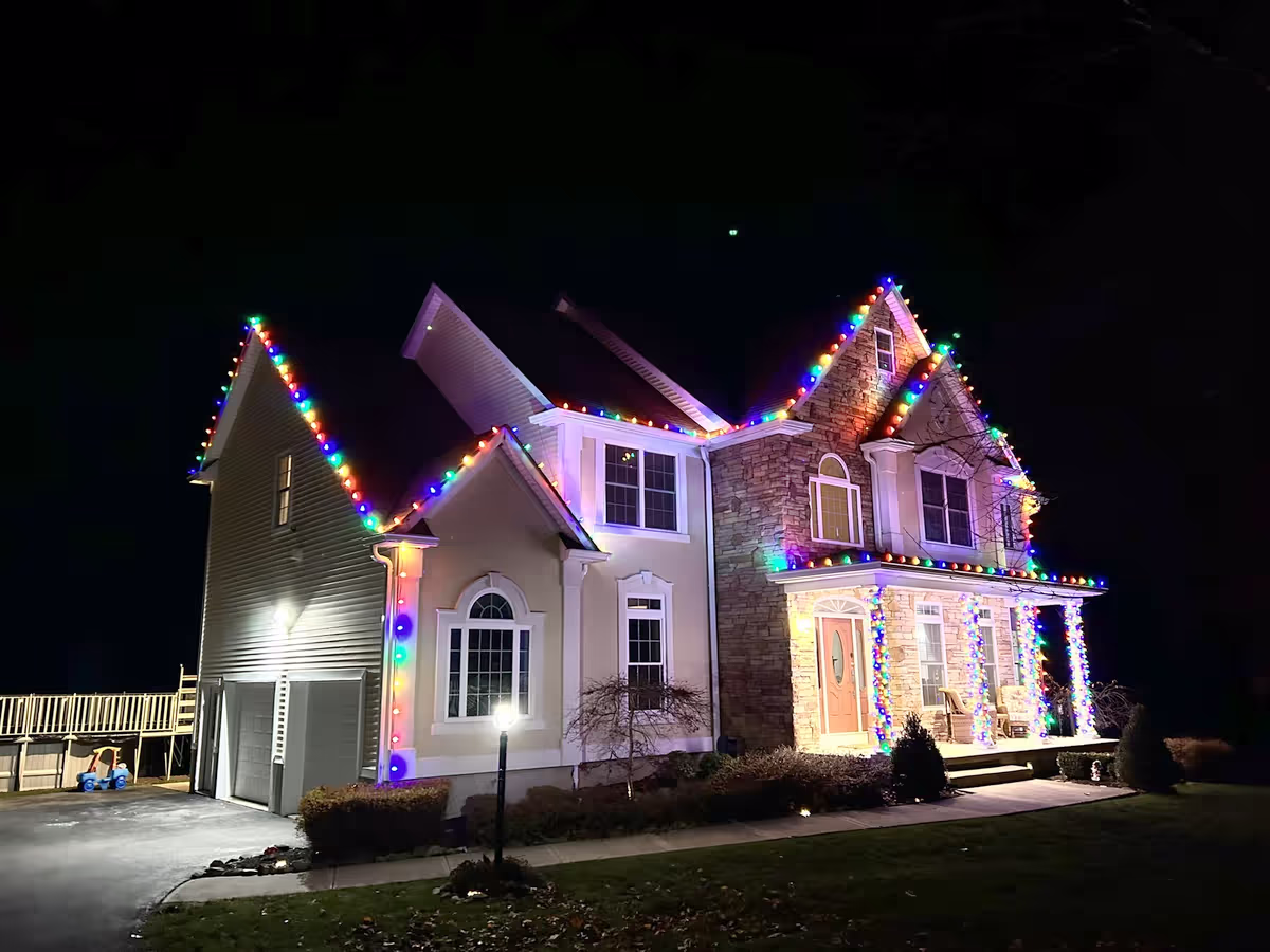 Christmas lights fishkill NY multicolor roofline
