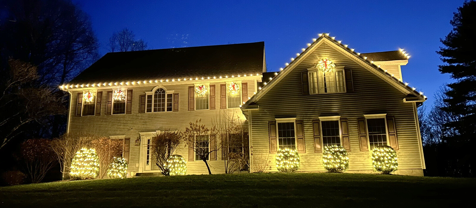 Festive The Bronx home at night